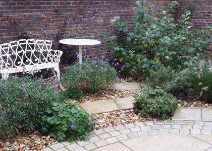 Circular patio with lush planting