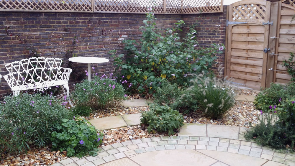 Circular patio with lush planting